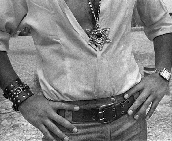"Israeli Macho", young man wearing big Star of David, Tel Aviv, Israel 1970s. Photo: Leni Sonnenfeld. (Beth Hatefutsoth, the Oster Visual Documentation Center, Sonnenfeld collection)