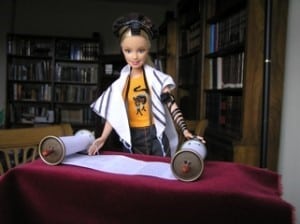 Tefillin Barbie Reading from the Torah Photo Courtesy of Jen Taylor Friedman