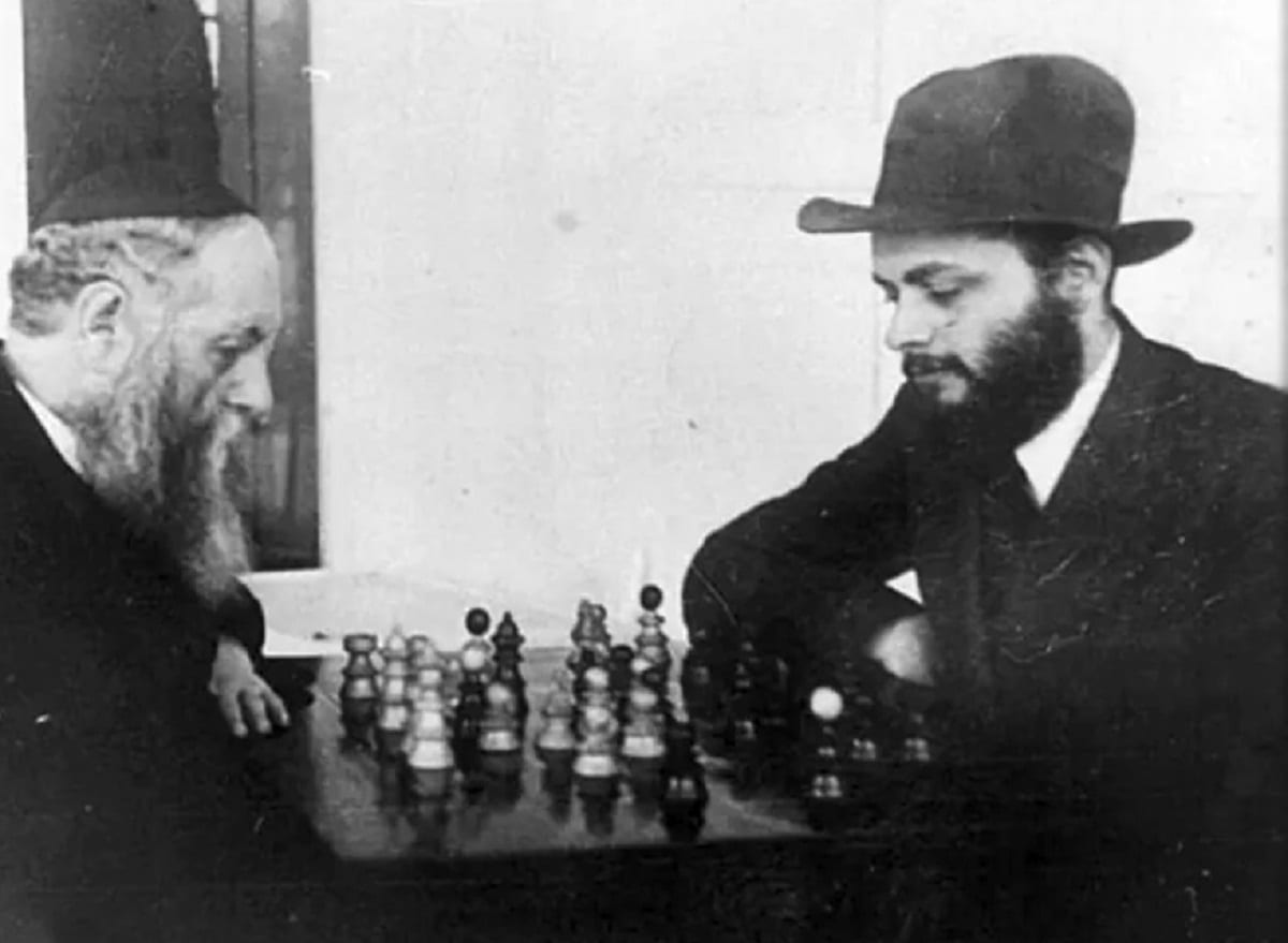 The Lubavitcher, Menachem Mendel Schneerson plays chess on NIttel Nacht with his father in law, rabbi Yosef Isaac Schneerson 