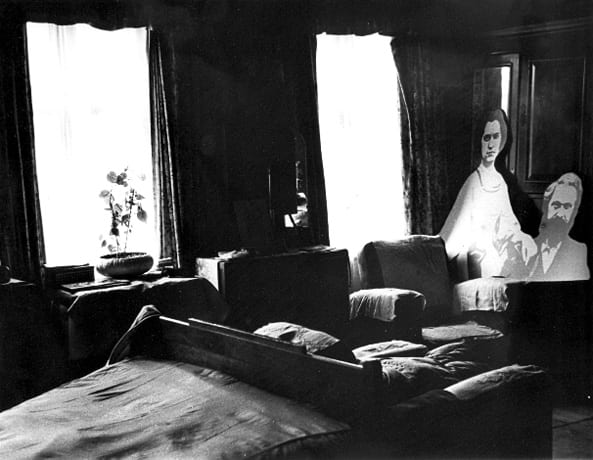 Bedroom of Karl Marx, with large cut-outs of Marx and his wife. While in exile, Marx wrote in this room "Das Kapital" in 1867. London, England 1936. Photo: Leni Sonnenfeld. Beit Hatfutsot, the Oster Visual Documentation Center, Sonnenfeld collection