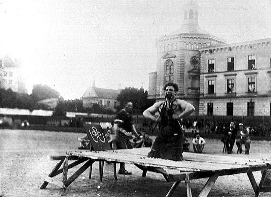 Zisha Breitbart ("Hero Samson") performing in public, Krakow, Poland, 1920's, Photo: Ze’ev Aleksandrowicz, the Oster Visual Documentation Center, ANU – Museum of the Jewish People, courtesy of the Ze’ev Aleksandrowicz family, Israel