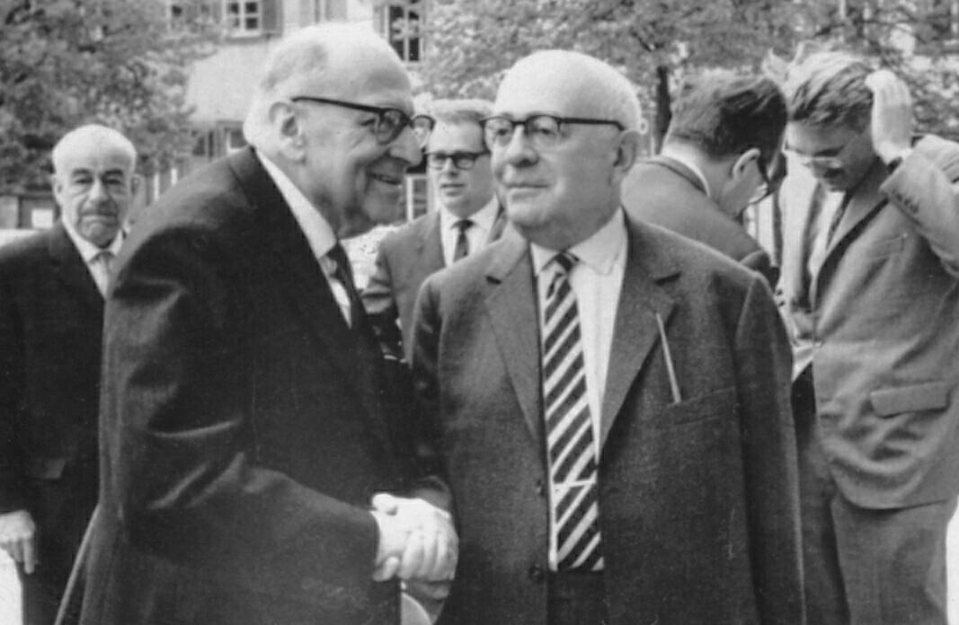 Horkheimer (front left), Adorno (front right), and Habermas is in the background, right. Heidelberg, 1964 (Photo: Jeremy J. Shapiro, Creative Commons)