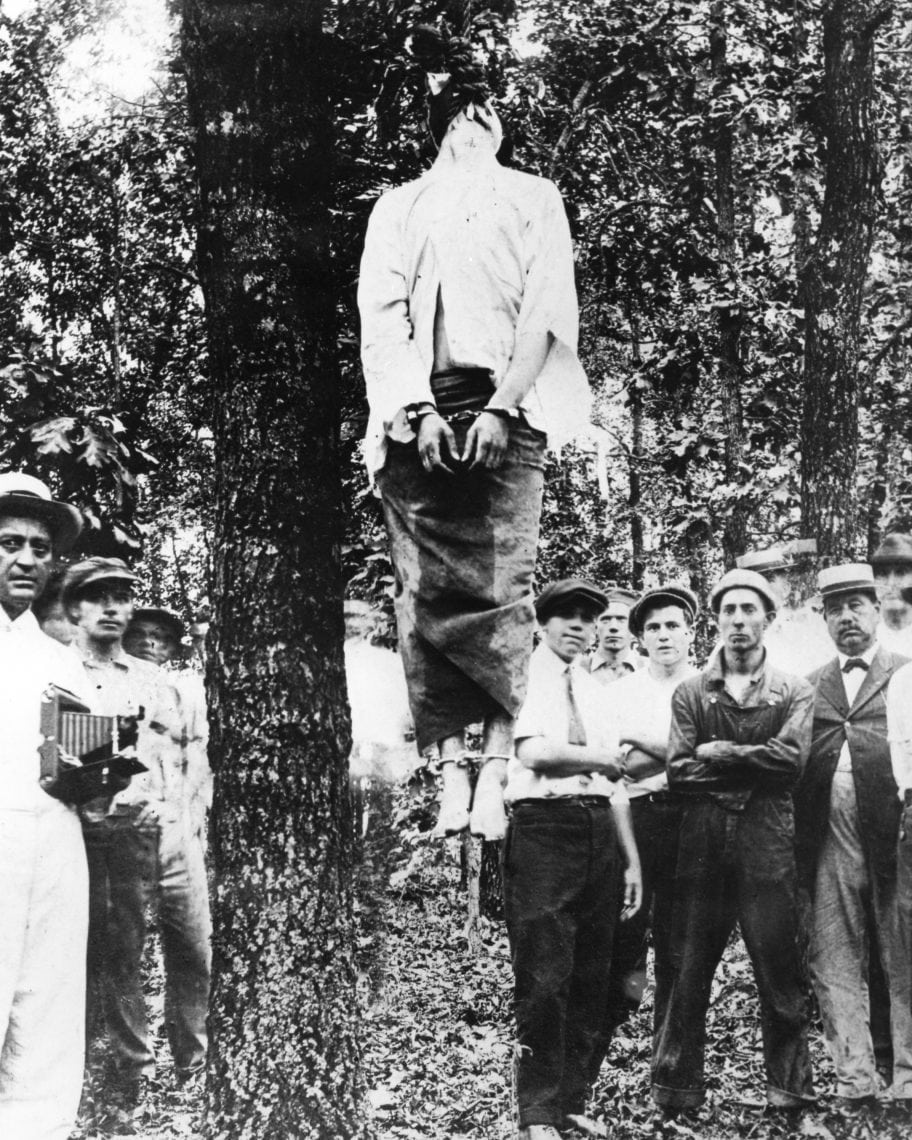 Lynching of Leo Frank, Cobb County, Georgia, on the morning of August 17, 1915. The man on the far right in the straw hat is Newton A. Morris (taken from the Kenneth G. Rogers Collection, Atlanta History Center, Atlanta, Georgia)
