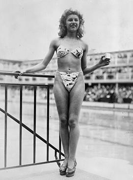 Micheline Bernardini at the new 'Bikini' swimming costume at the Molitor swimming pool in Paris. a similar two-piece design was produced by French designer Jacques Heim (Photo by Keystone/Getty Images/Wikipedia)