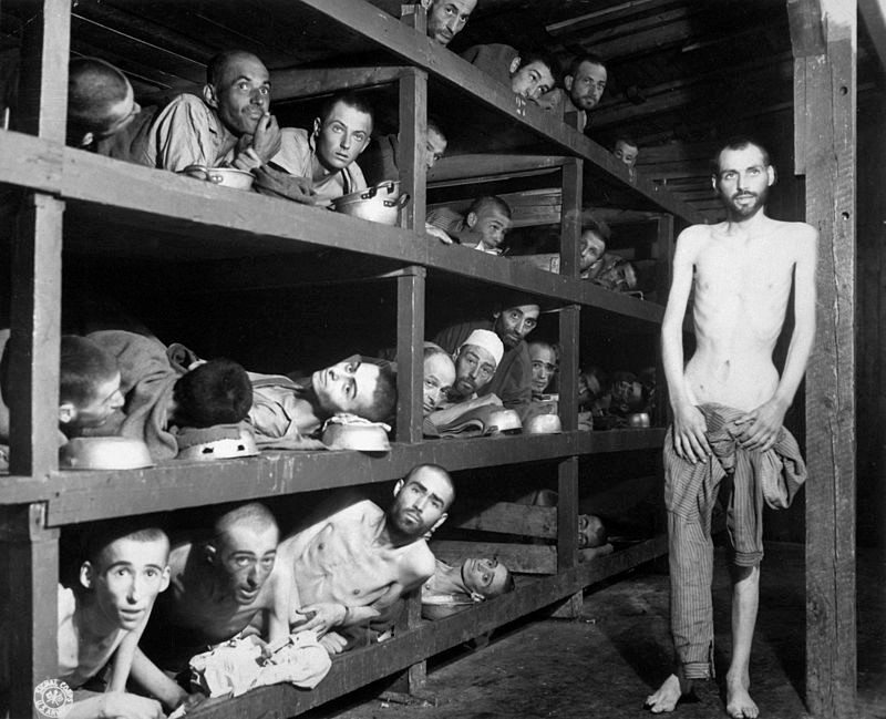 The liberation of Buchenwald concentration camp – Elie Wiesel lies, second row from bottom, seventh from left