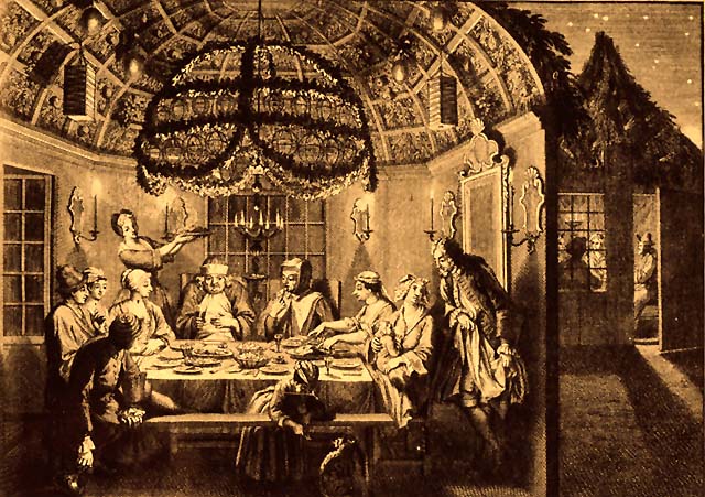 משפחה של יהודים אנוסים יושבת בסוכה. תחריט מאת ברנאר פיקאר, אמסטרדם, הולנד, המאה ה17. (המרכז לתיעוד חזותי ע"ש אוסטר, אנו - מוזיאון העם היהודי)