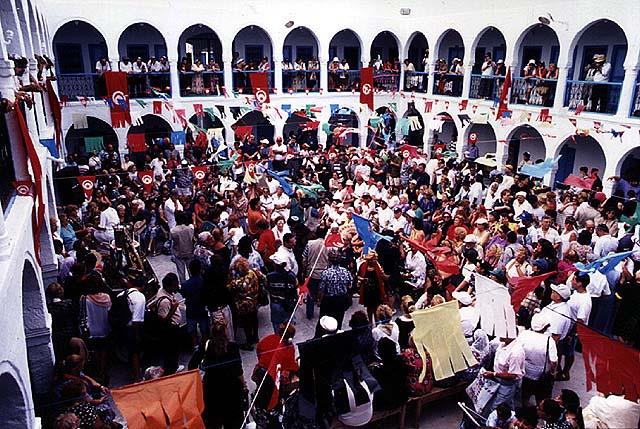 Celebrants at the Hilula of R. Shimon Bar Yohai, Lag ba’Omer, Djerba, Tunisia, 1995. Photo: Micha Bar-Am. The Oster Visual Documentation Center, ANU – Museum of the Jewish People