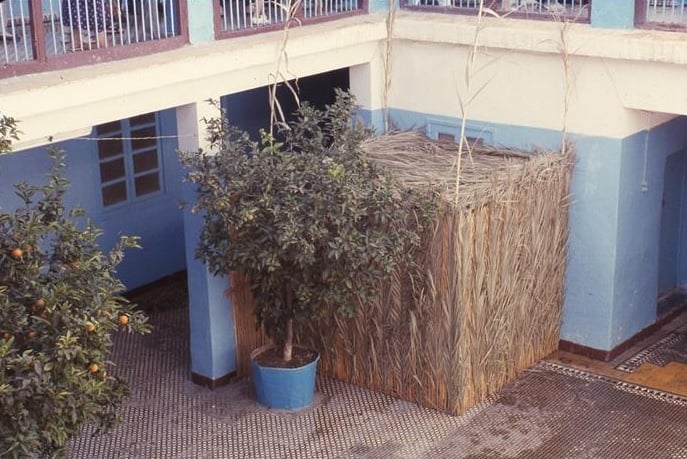 Sukkah in the courtyard of Salat Al Azama Synagogue, Marrakesh, Morocco, 1992. Photo: Than Wyenn. The Oster Visual Documentation Center, ANU – Museum of the Jewish People, Than Wyenn collection